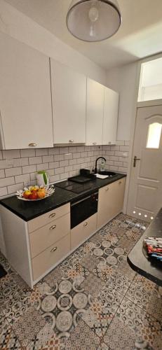 Kuchyňa alebo kuchynka v ubytovaní Apartament Gdańska 19 blisko morza