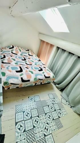 Кровать или кровати в номере Studio Comtat Ventoux