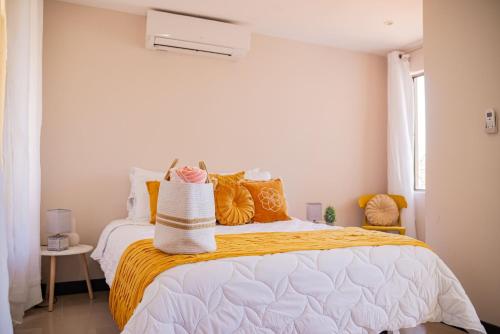 Ein Bett oder Betten in einem Zimmer der Unterkunft Sunset Harmony, Your Escape at Playa Hermosa