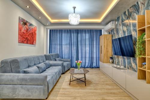 Χώρος καθιστικού στο COMFORT APARTMENT NEAR THE BEACH