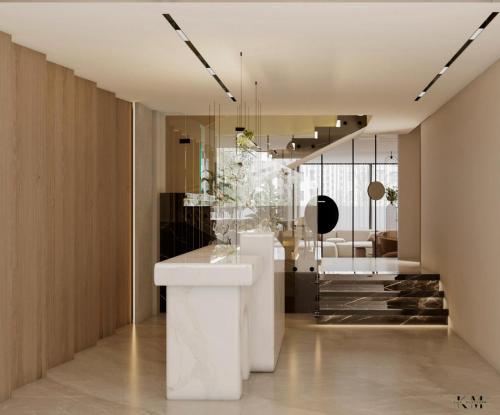 a living room with a white table in the middle at Lacasa Residence in Cairo