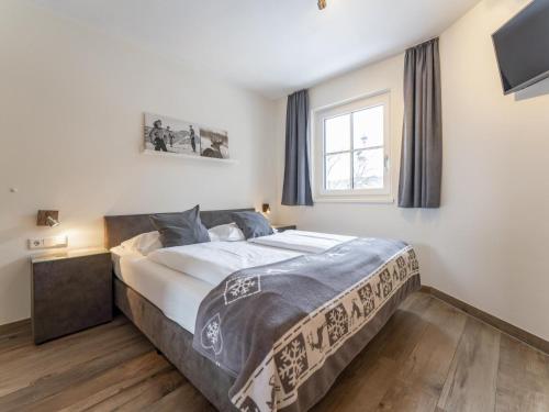 Postel nebo postele na pokoji v ubytování Luxury Tauern Suite Walchen Kaprun 1