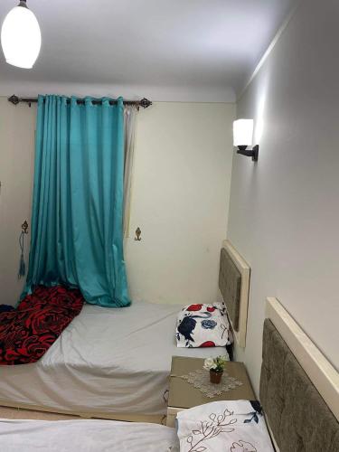 Katil atau katil-katil dalam bilik di Rental Apartment Sea View