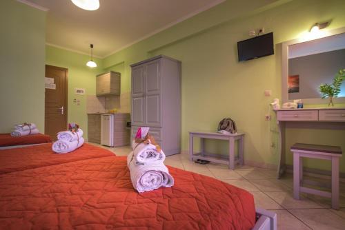 Postel nebo postele na pokoji v ubytování Anemona Beach Hotel