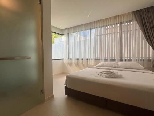 Postelja oz. postelje v sobi nastanitve 3 BR Diamond Pool Villa - 15 Minutes to Bangtao Beach