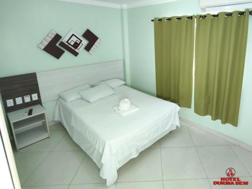Katil atau katil-katil dalam bilik di HOTEL DURMA BEM LTDA EPP