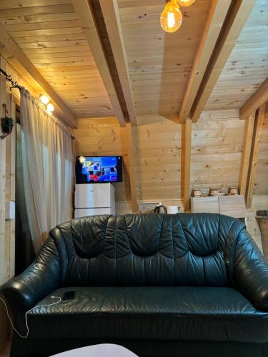 TV a/nebo společenská místnost v ubytování Woodland Cottage