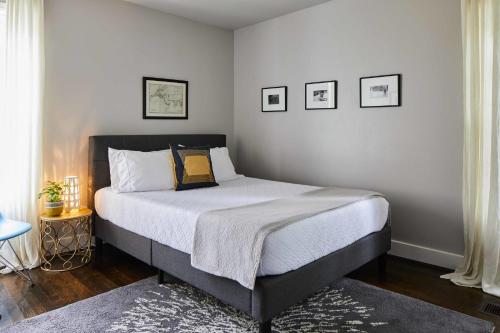 a bedroom with a large bed in a room at Modern, Pet-Friendly Retreat, Named Best BnB in Bham in Birmingham