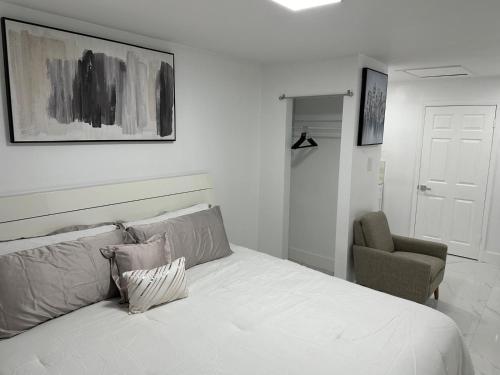 מיטה או מיטות בחדר ב-Adrien Guest Studio