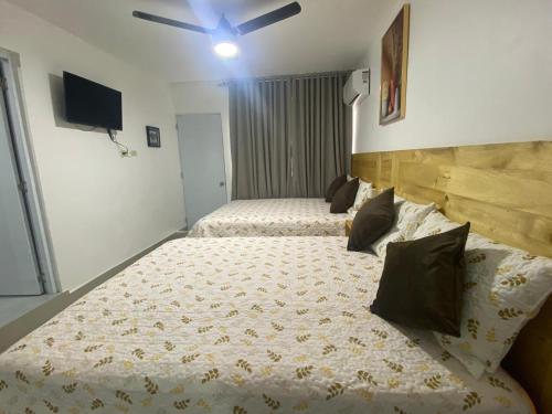 Llit o llits en una habitació de Room in Samana