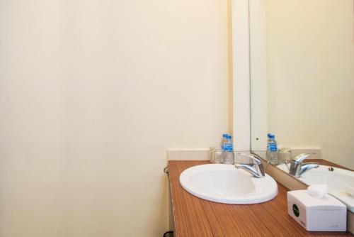 Bathroom sa Spazzio Bali Hotel