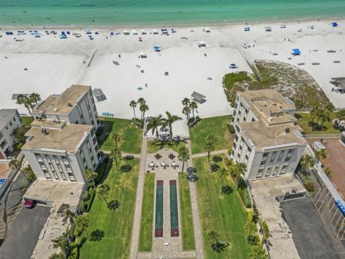 an aerial view of a building and the beach at Island House Beach Resort 14N in Siesta Key