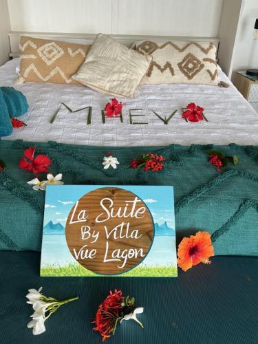 Cama o camas de una habitación en La Suite Vue Lagon