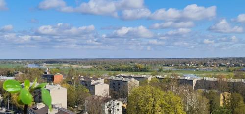 a view of a city with trees and buildings at Panorama Suite Jelgava in Jelgava