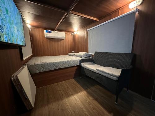 Postel nebo postele na pokoji v ubytování VIP Caravan