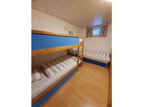 Bunk bed o mga bunk bed sa kuwarto sa Apartment Chalet Beatrice Share