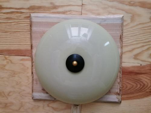 a white doughnut sitting on top of a table at Ferienhaus Emilia in Wilthen