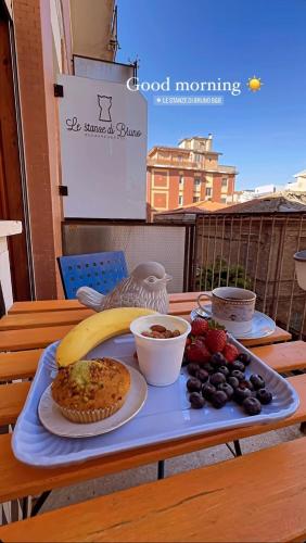 a tray of food on a table with a plate of food at Le stanze di Bruno in Pescara