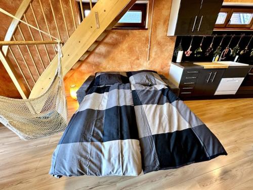 a hammock in the middle of a room at Apartment Joelle mit Sauna, Schwimmteich und Gym in Erbach im Odenwald