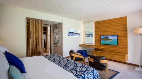 TV o dispositivi per l'intrattenimento presso Paradis Beachcomber Golf Resort & Spa