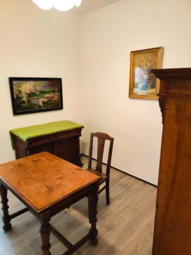 a room with a table and a chair and a desk at Haus Semmi in Fürstenfeld