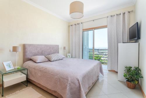 Apartment with comfortable Terrace, 2 Swimming pools & Tennis court