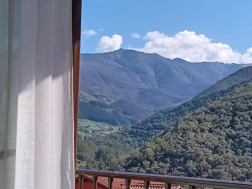 a view of a mountain view from a window at Apartamentos Calm & Nature - Adults Only in Cabezón de Liébana