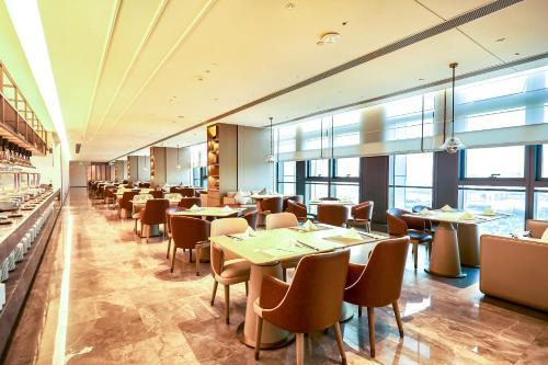 Restaurace v ubytování Guangzhou Pazhou LN DongFang Hotel-Free shuttle between hotel and Exhibition Center during Canton Fair & Exhibitor Registration Counter