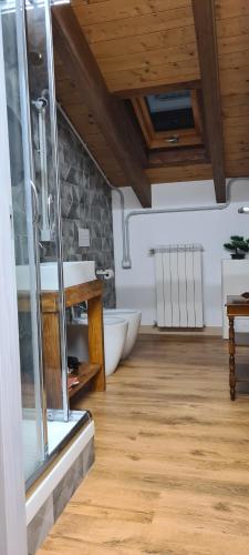 a bathroom with a bath tub and a sink at La collina in Tagliacozzo