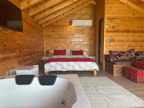 Ένα ή περισσότερα κρεβάτια σε δωμάτιο στο PUGARi HOTEL