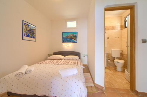 Koupelna v ubytování Villa Natura - infinity pool, magical nature and view, complete privacy - by Traveler tourist agency ID 2136