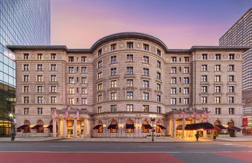 a large building with flags in front of it at Fairmont Copley Plaza in Boston