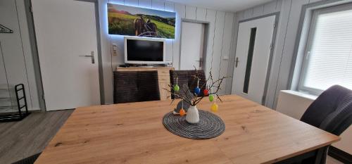 Ferienhäuser Hohe Klingeにあるテレビまたはエンターテインメントセンター
