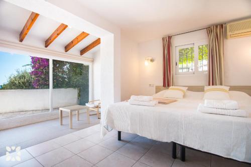 Postel nebo postele na pokoji v ubytování Villa Vista Mar by Abahana Villas