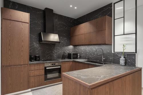 Η κουζίνα ή μικρή κουζίνα στο Patra Elegant Residence