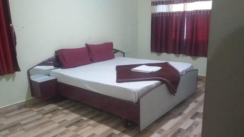 Ένα ή περισσότερα κρεβάτια σε δωμάτιο στο FLGHR RSR Resort