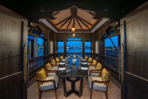 a dining room with a table and chairs at Anantara Mina Ras Al Khaimah Resort in Ras al Khaimah