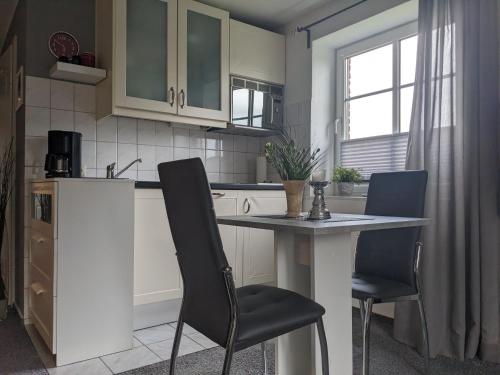 Kuchyň nebo kuchyňský kout v ubytování Ferienwohnung Ankerplatz