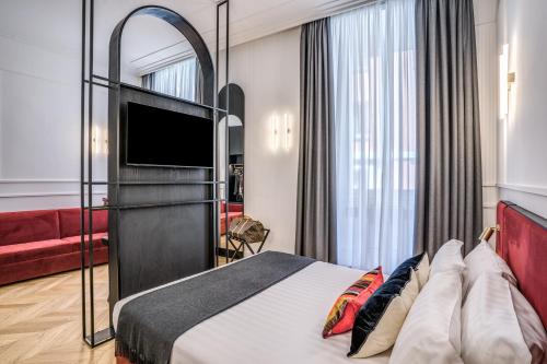 Letto o letti in una camera di Residenza Piranesi Boutique Hotel