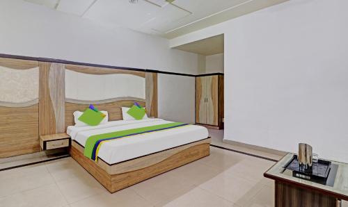 En eller flere senge i et værelse på Hotel G B Palace