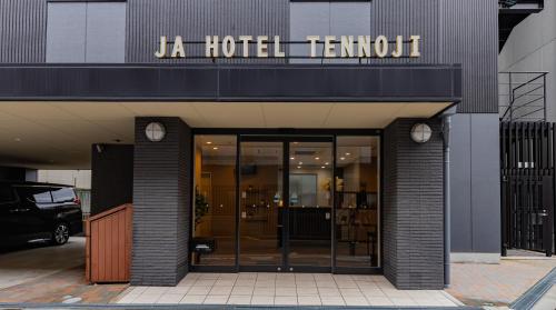 a hotel sign on the front of a building at JA Hotel Tennoji in Osaka