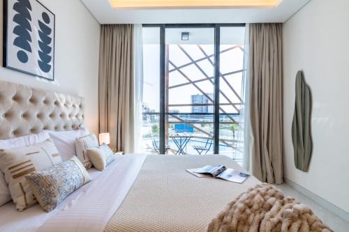 Un pat sau paturi într-o cameră la The Smart Concierge - Samana Hills
