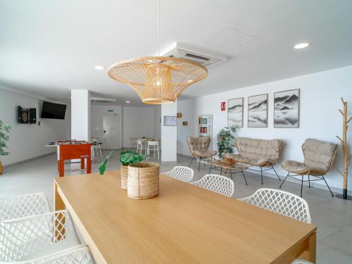 a dining room with a table and chairs at Apartment Bayview Hills by Interhome in Torrox Costa