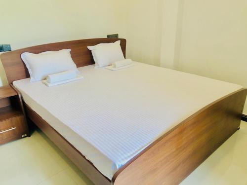Cama o camas de una habitación en SKY SEA-Arugambay