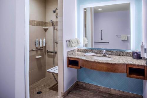 a bathroom with a sink and a shower at Hilton Garden Inn Charleston / Mt. Pleasant in Charleston