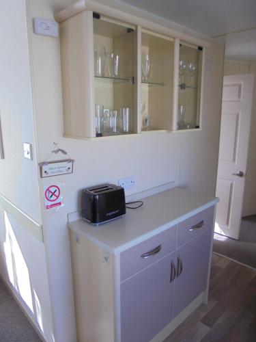 A kitchen or kitchenette at Sapphire 8 Berth panel heated Towervans