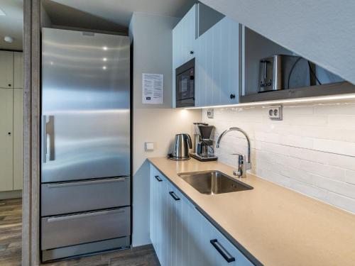 Kuchyň nebo kuchyňský kout v ubytování Holiday Home Uniikki 75- c402 by Interhome