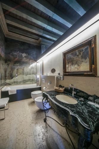 Ένα μπάνιο στο Relais Castello Bevilacqua