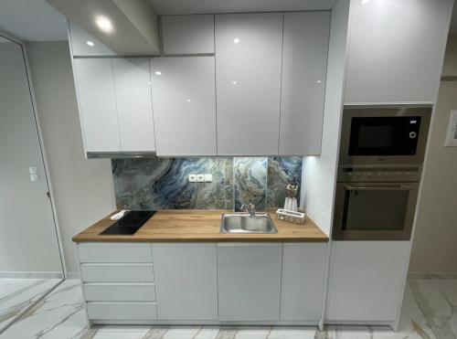 Kuchyň nebo kuchyňský kout v ubytování AGORA luxury APARTMENT 7