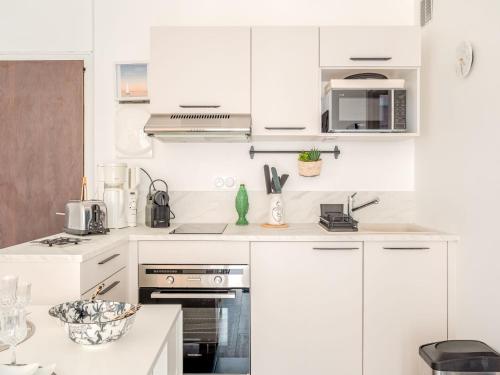Η κουζίνα ή μικρή κουζίνα στο Apartment Le Manon by Interhome